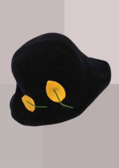 Chapeau cloche femme noir décoration 2 feuilles jaune chaud de côté | Cap-Chapeau